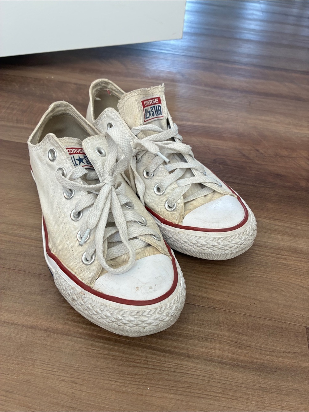 Converse Low Top Sneakers in Off-White with Red Trim